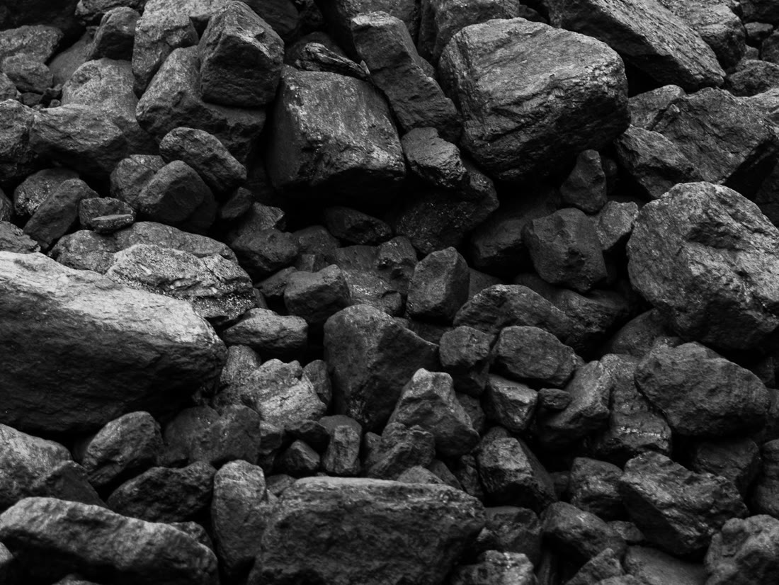 Pile of grey, lustrous anthracite coal lumps